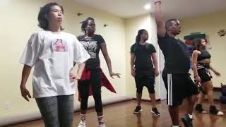 Father Julian De La Blanca teaching Runway Voguing fundamentals at his haus rehearsal.