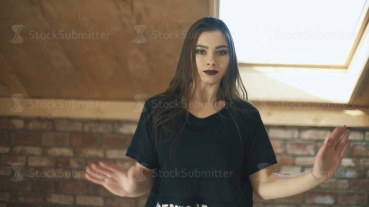 beautiful athletic girl dancing vogue and jumping Mid shot