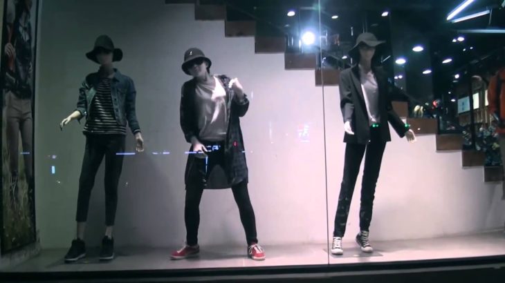 Girl posing as manikin performs insane dubstep dance