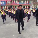 Pupils shuffle dance with principal during break in Shanxi, China