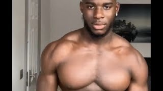 Moses does a pec dance and some flexing