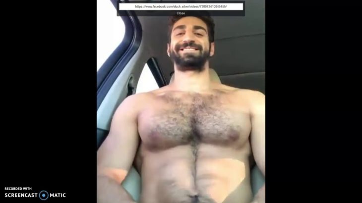 Dude dancing/pec flexing in car
