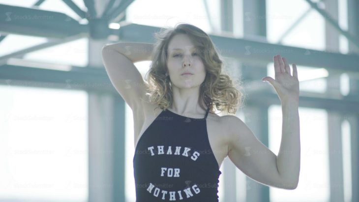 New way vogue – flexing. Young slender woman dances vogue alone