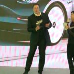 Elon Musk flexing in Shanghai